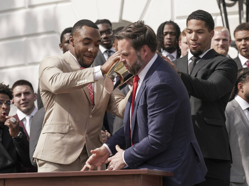 JD Vance drops the College Football Playoff National Championship Trophy
